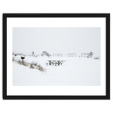 Tables and benches in a snow-covered park thumbnail