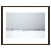 Fence in the winter seascape