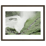 Tourists walking around the waterfall - Iceland thumbnail