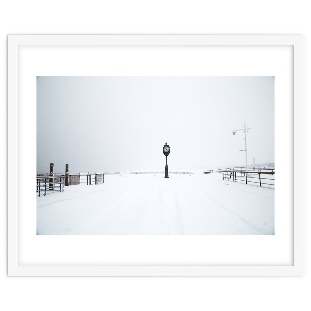 A clock tower in the snow beach