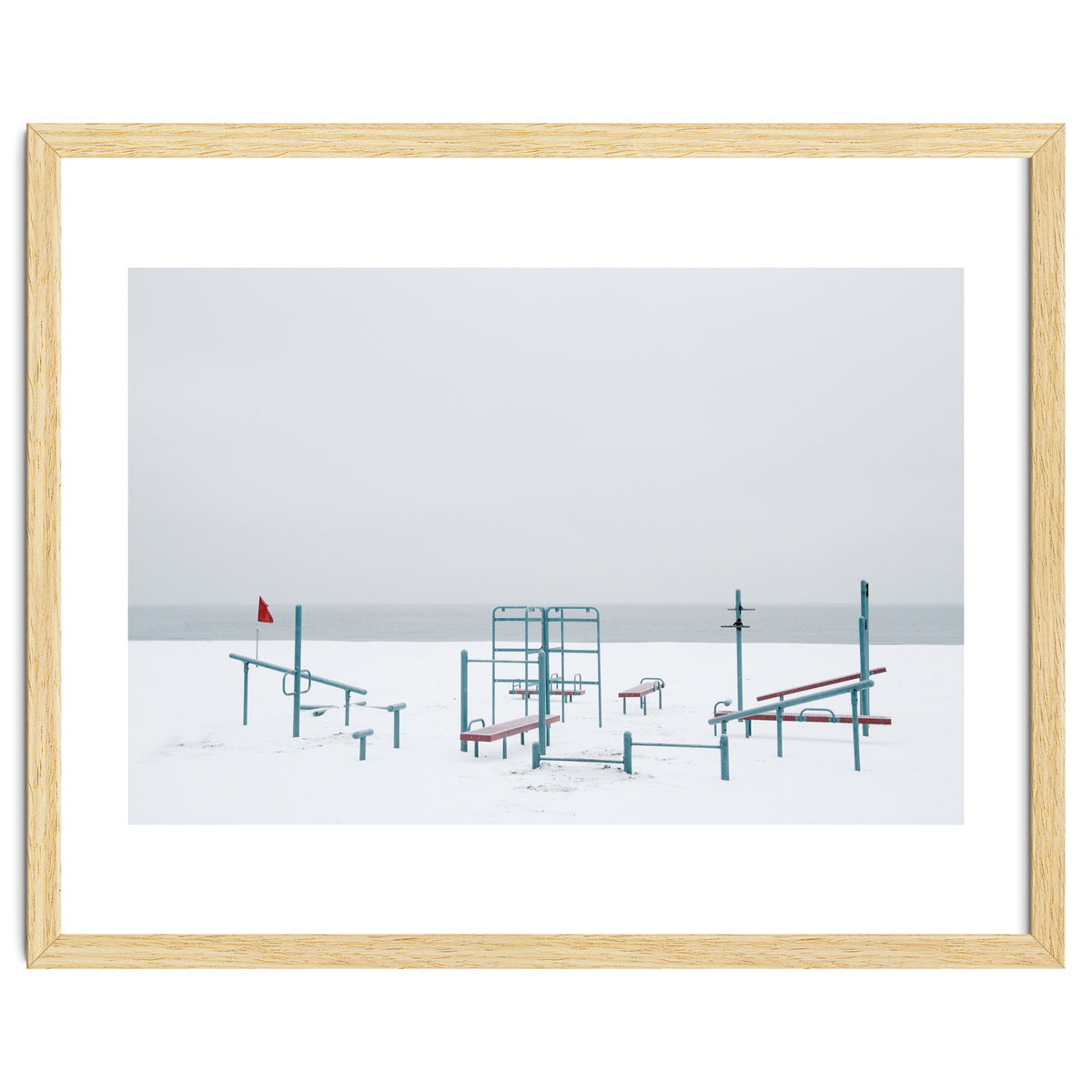 Playground in the winter snow beach