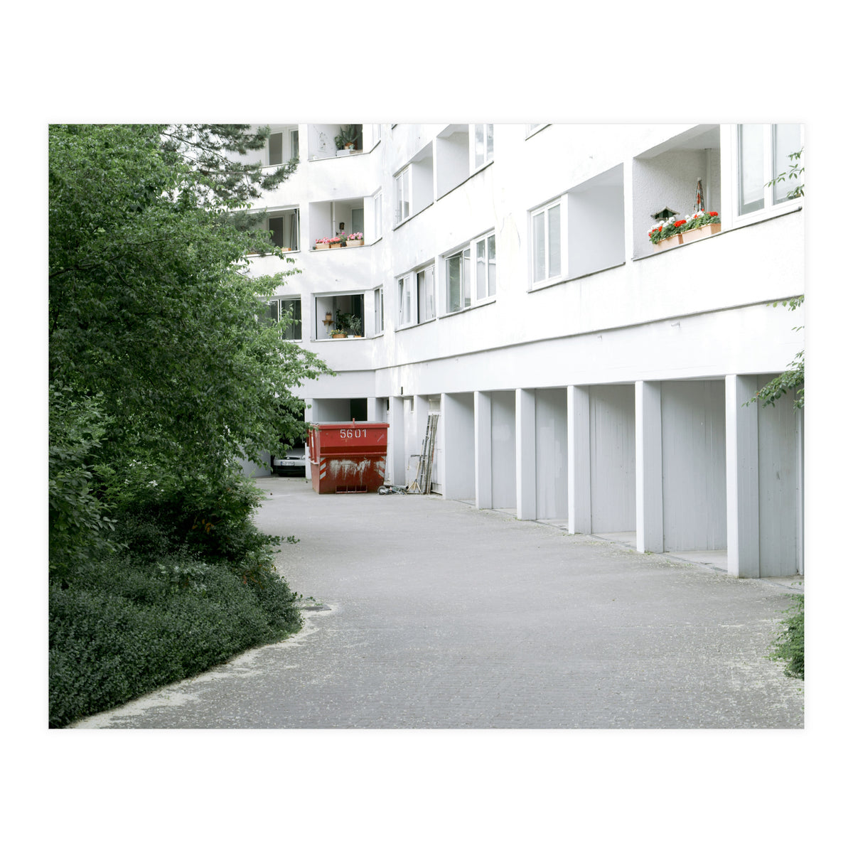 Red container in the residential site (Print Only)