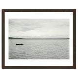 A boy pedaling the Board on the Lake - Iceland thumbnail