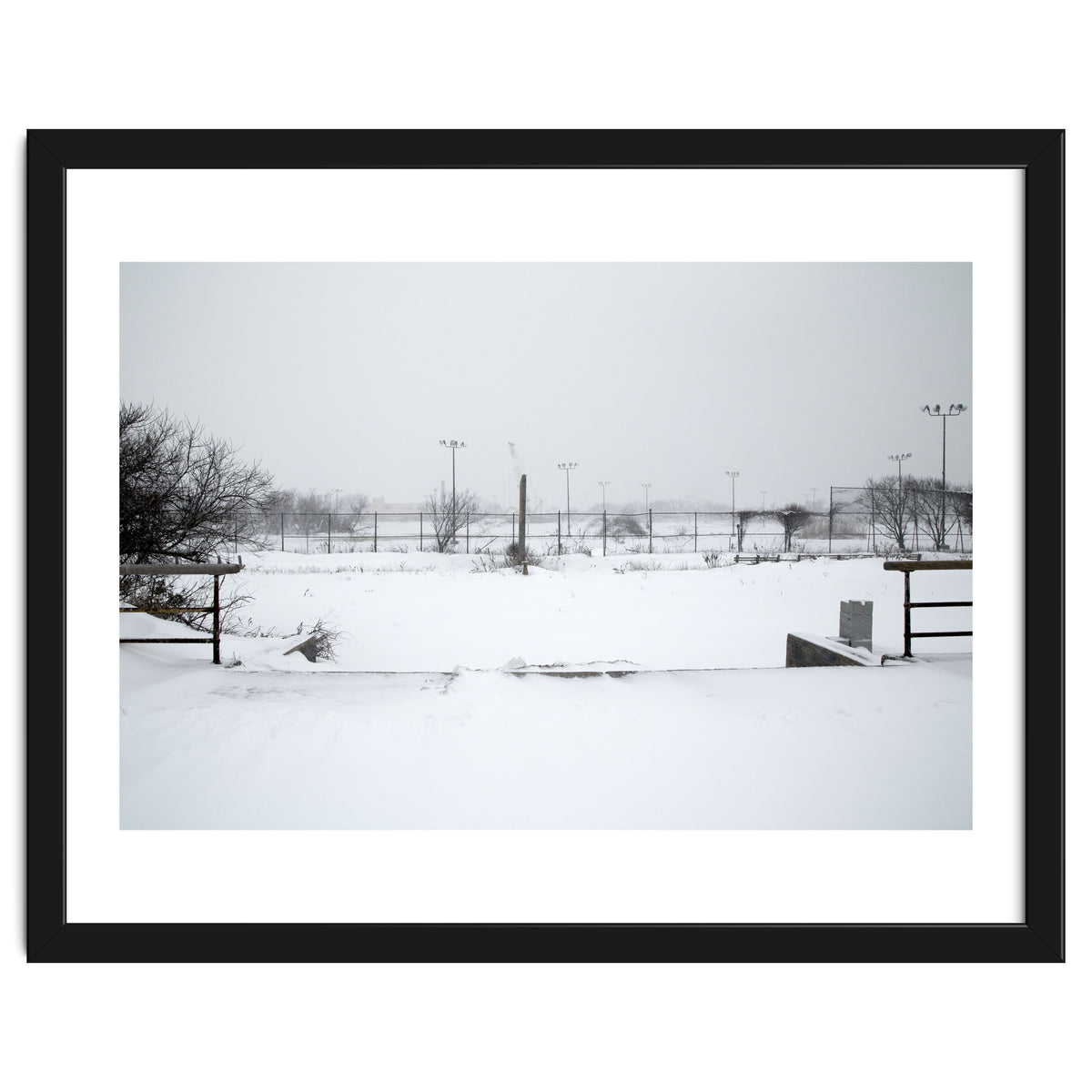 Baseball field covered in snow