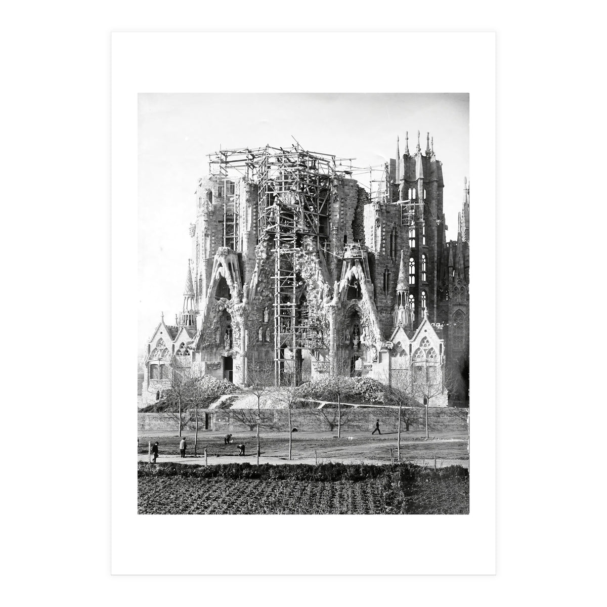 VIEW OF THE "SAGRADA FAMILIA" BASILICA BY ARCHITECT ANTONI GAUDI, PHOTOS OF WORK.  Ca. 1910. (Print Only)