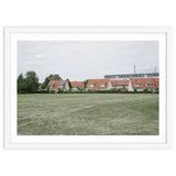 Red roof houses in the green field thumbnail