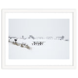 Tables and benches in a snow-covered park thumbnail