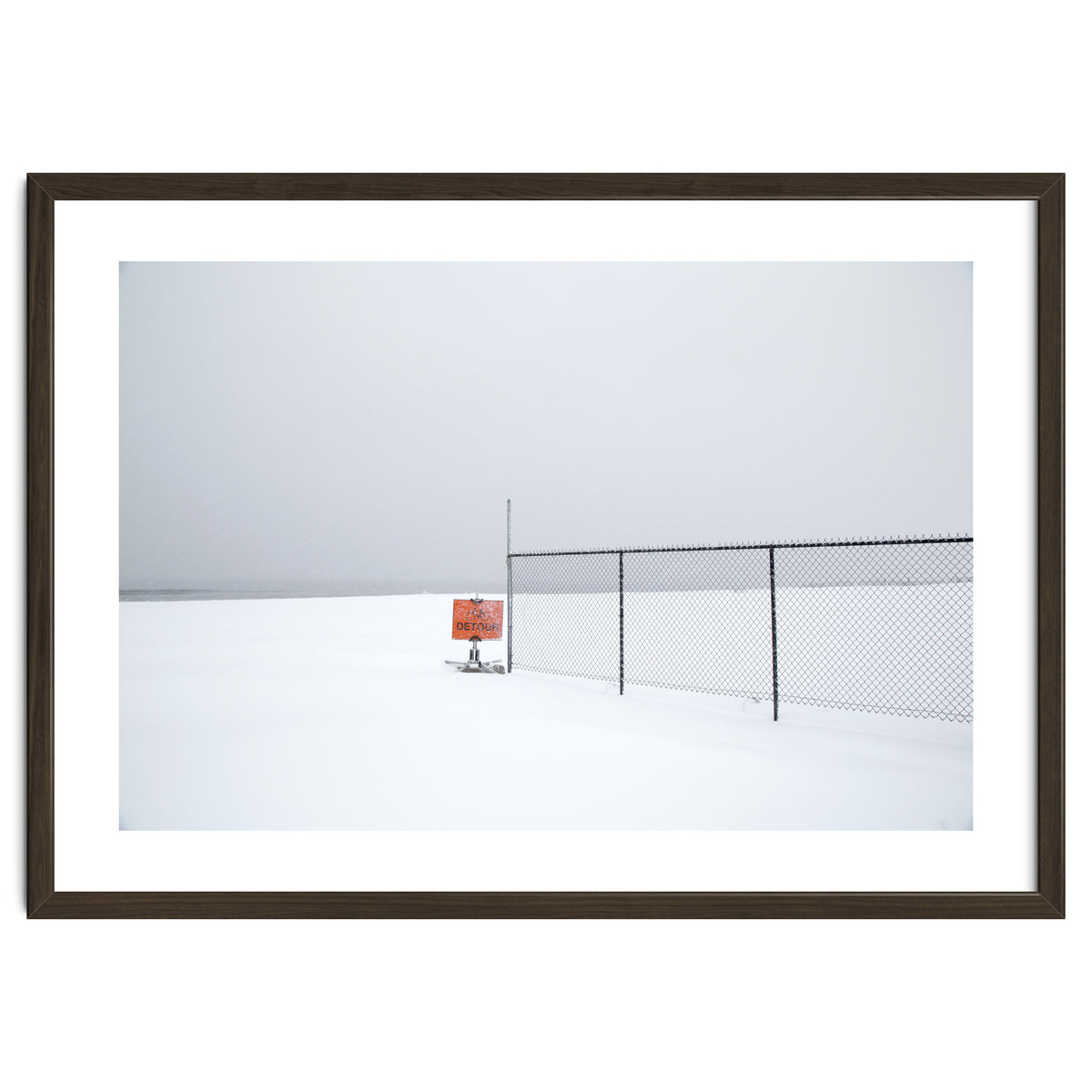 Detour sign in the snow beach