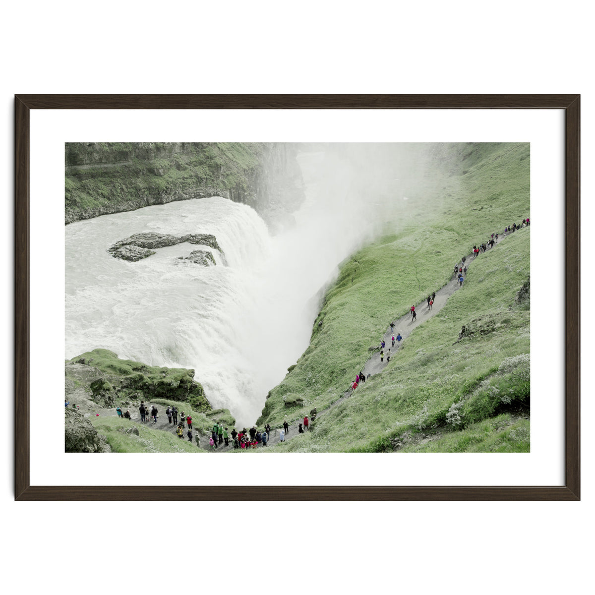 Tourists walking around the waterfall - Iceland
