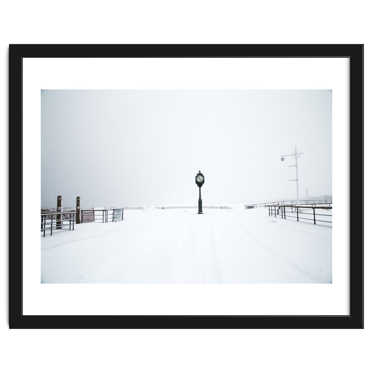 A clock tower in the snow beach