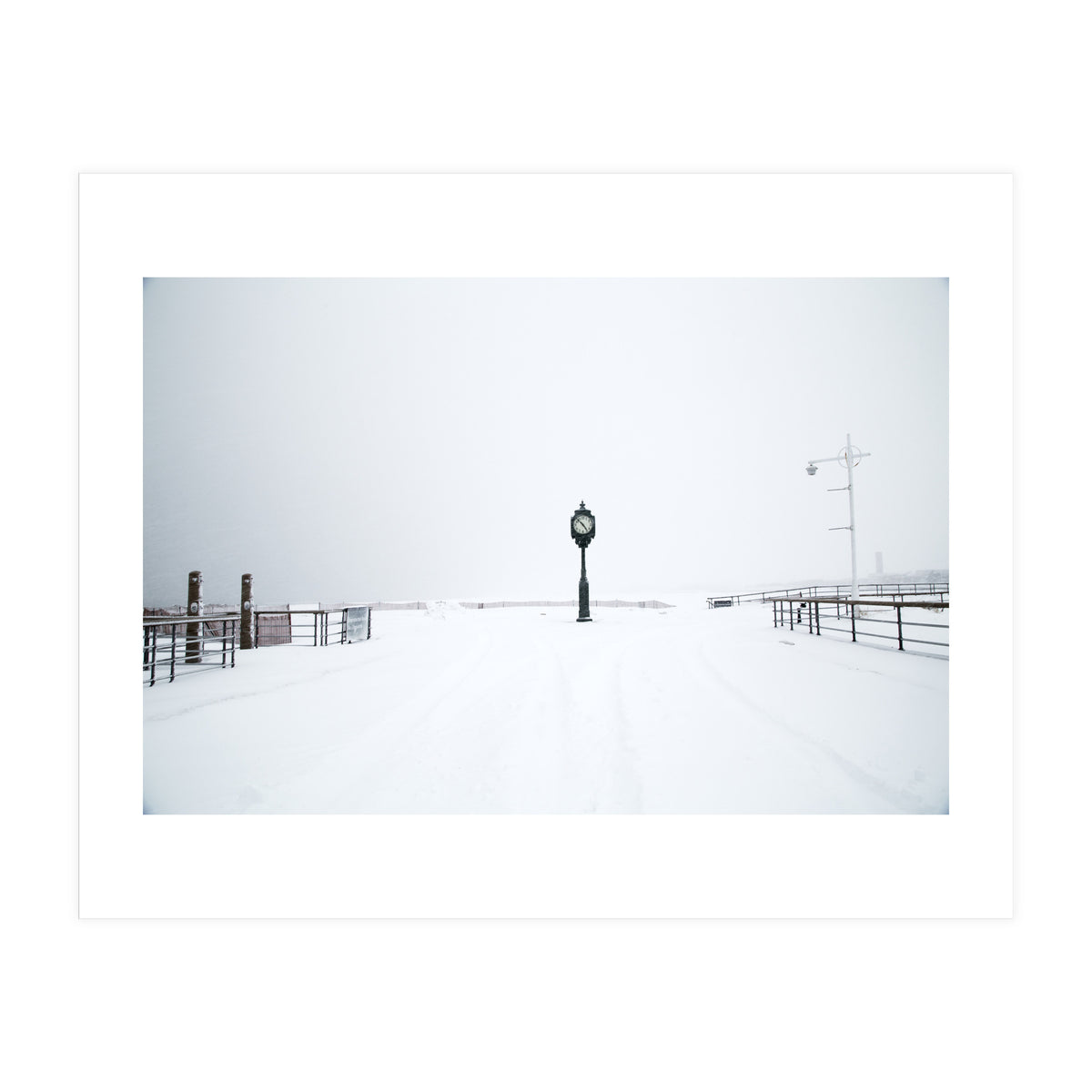 A clock tower in the snow beach (Print Only)