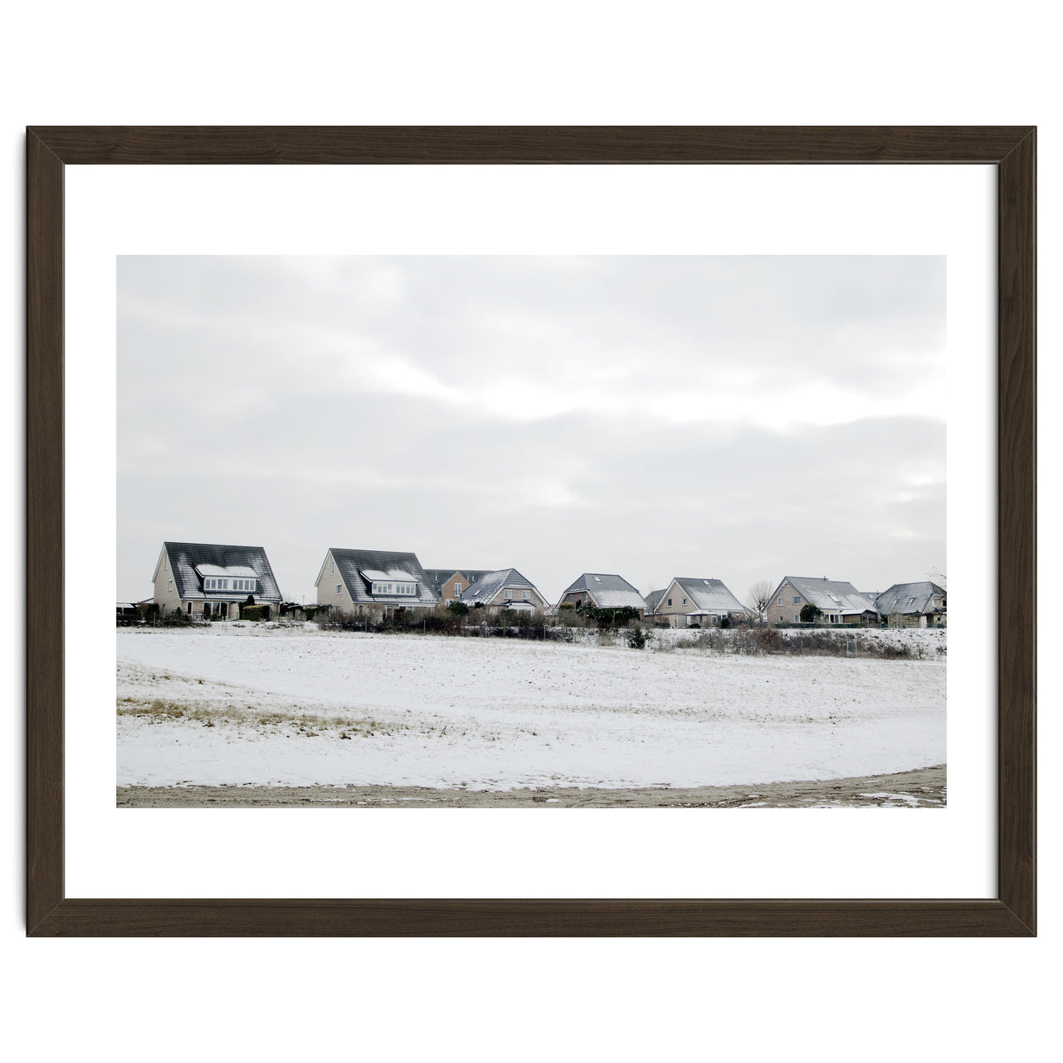 Snow covered houses on the hill