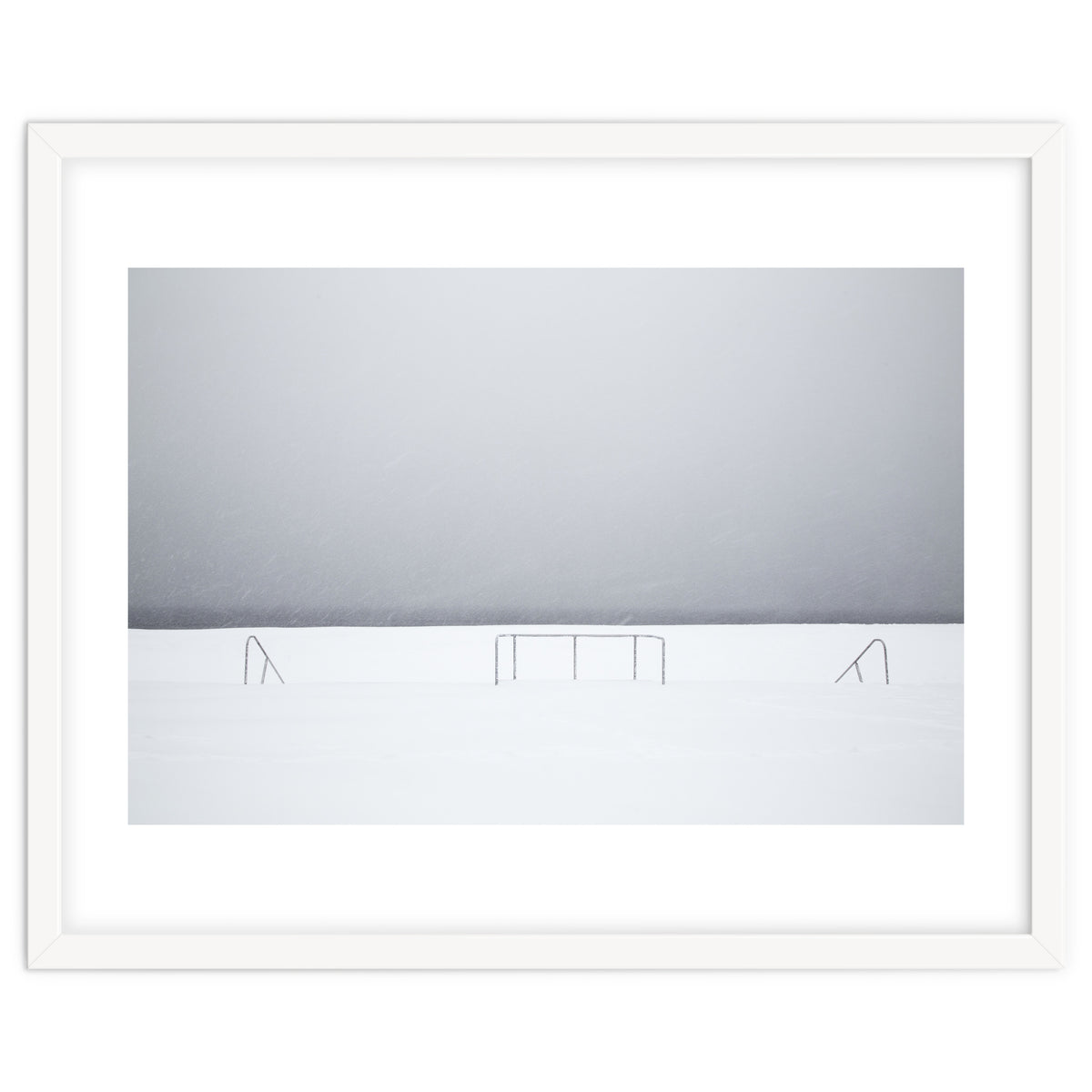 Stair railing covered by snow