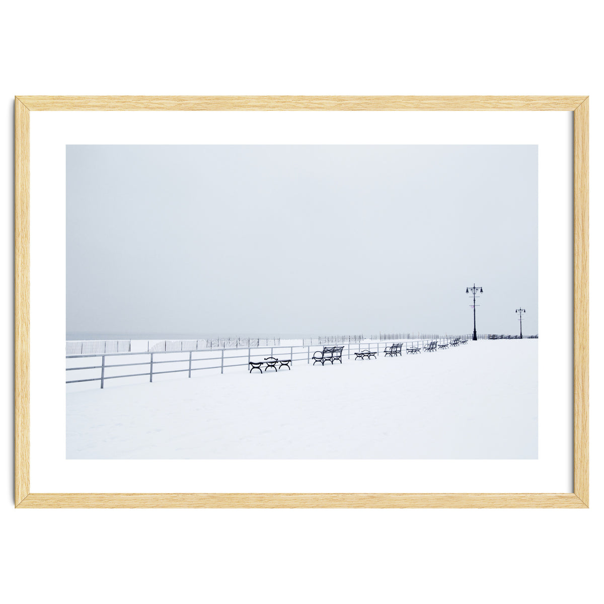 Benches along the pier on snow beach