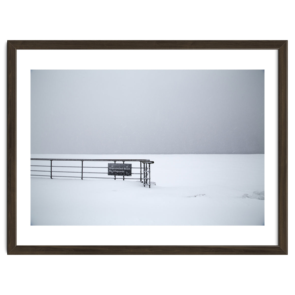 No lifeguards on the sign board in the winter snow beach
