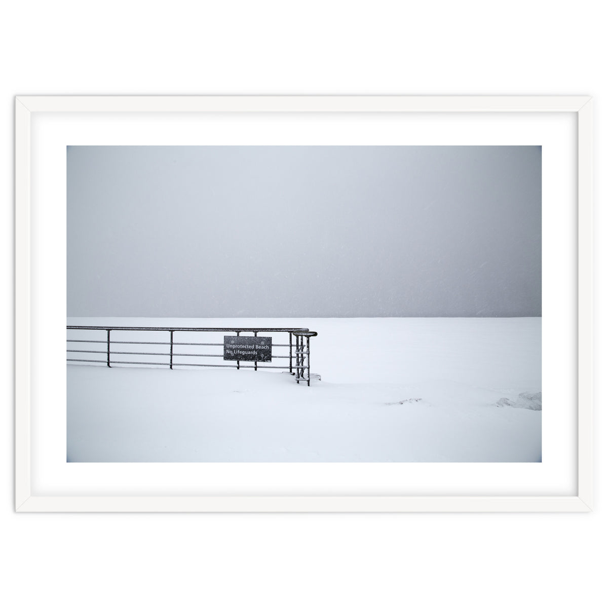 No lifeguards on the sign board in the winter snow beach
