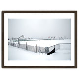 Snow-covered deserted basketball court in winter thumbnail