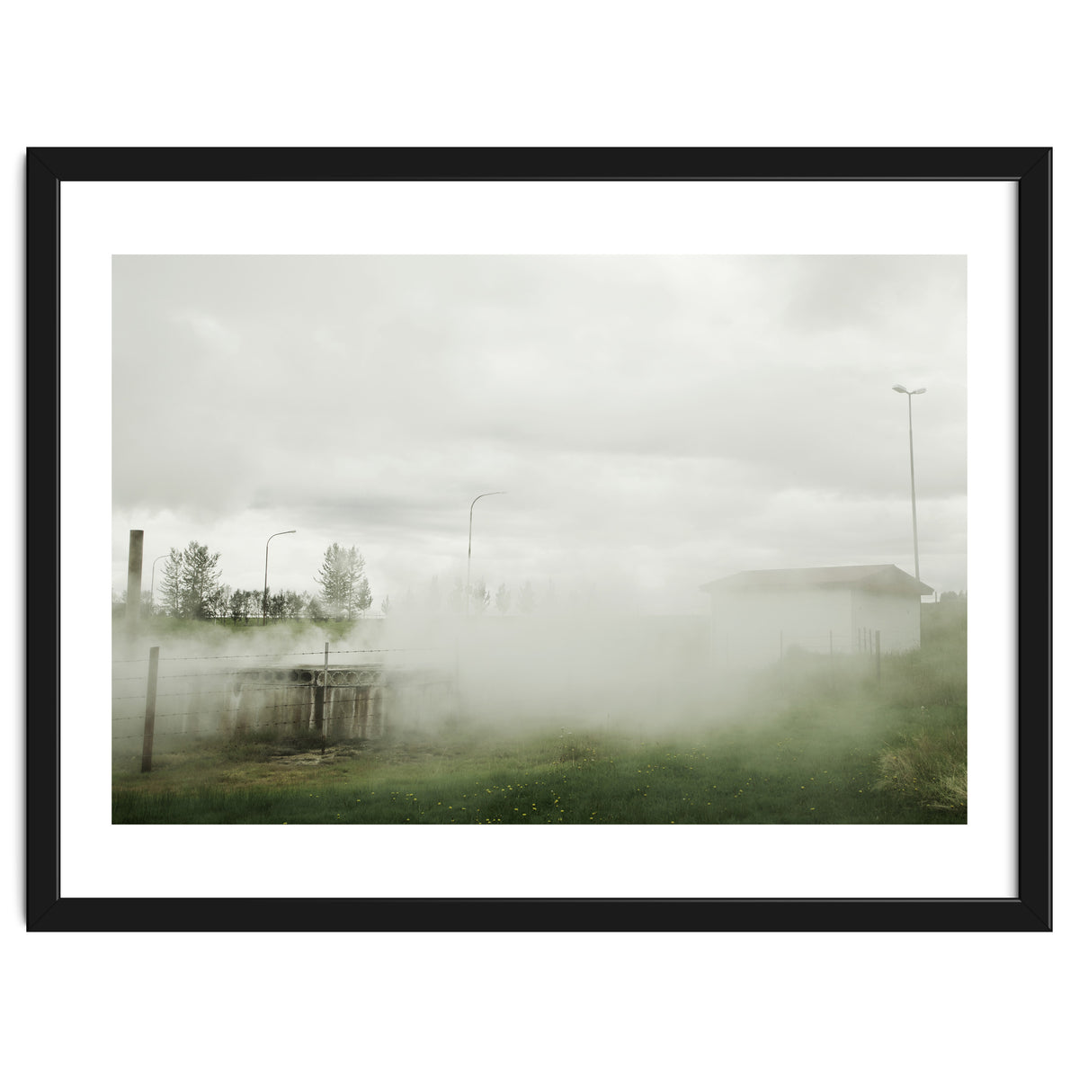 A source covered in steam from a hot spring - Iceland