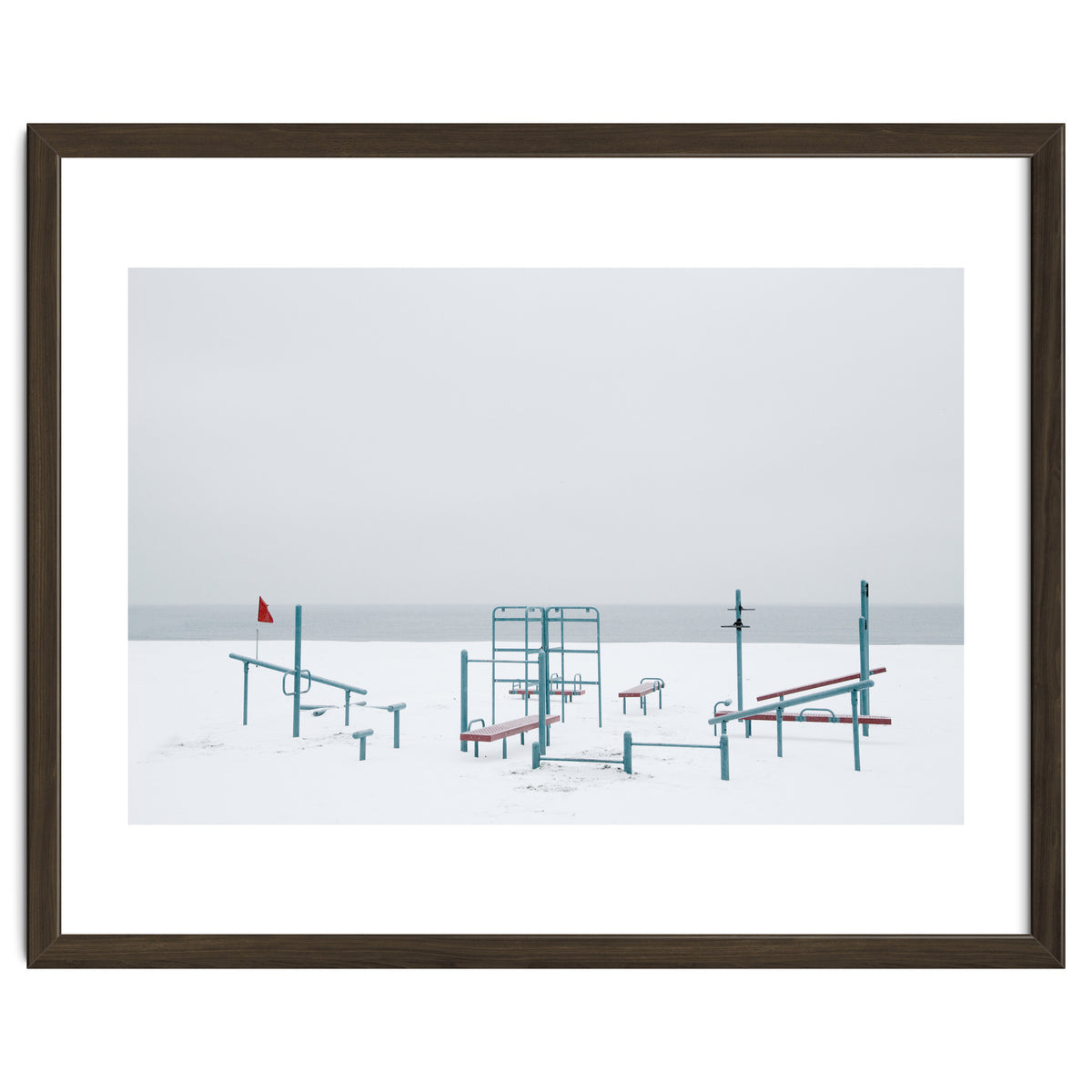 Playground in the winter snow beach