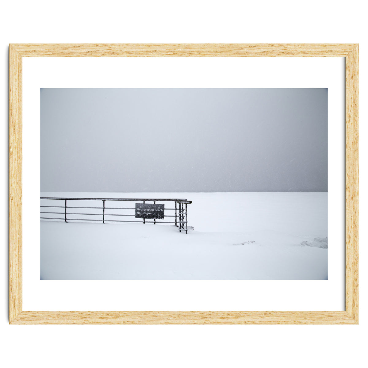 No lifeguards on the sign board in the winter snow beach