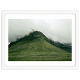 Green mountain covered in clouds - Iceland thumbnail