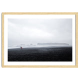 Family walking on the black sand beach - Iceland thumbnail