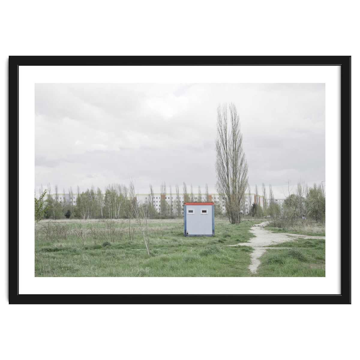 Hut in the middle of green field