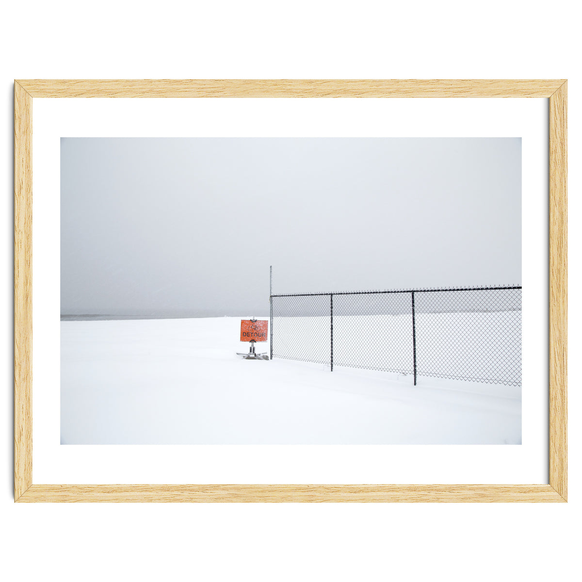 Detour sign in the snow beach