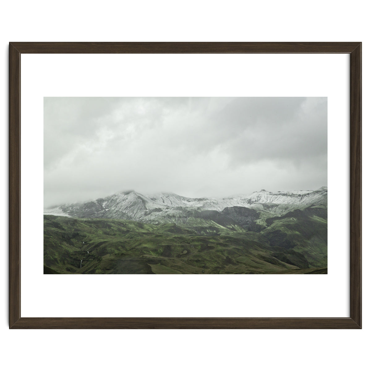 Snow-covered green mountains - Iceland