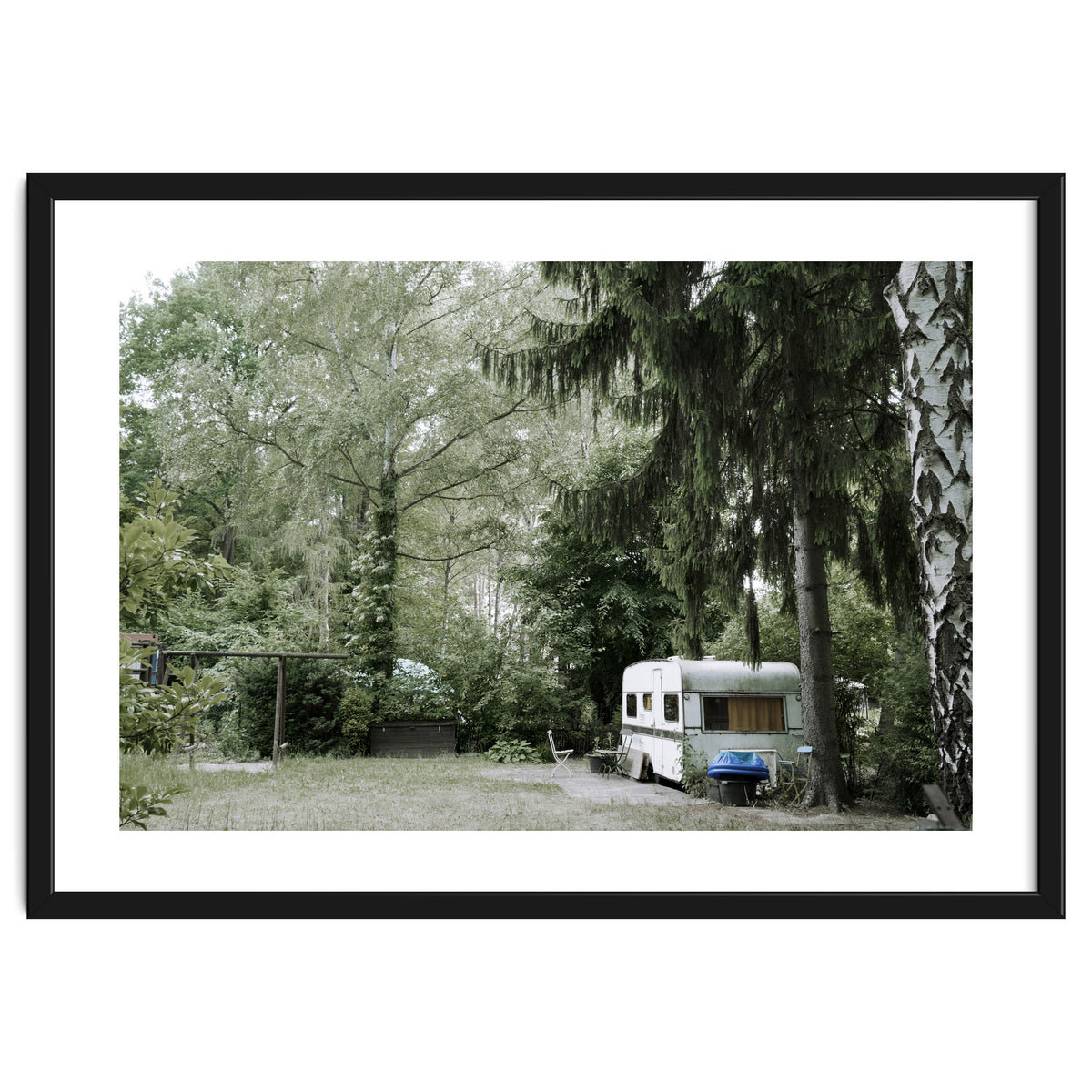 Travel trailer in the green garden