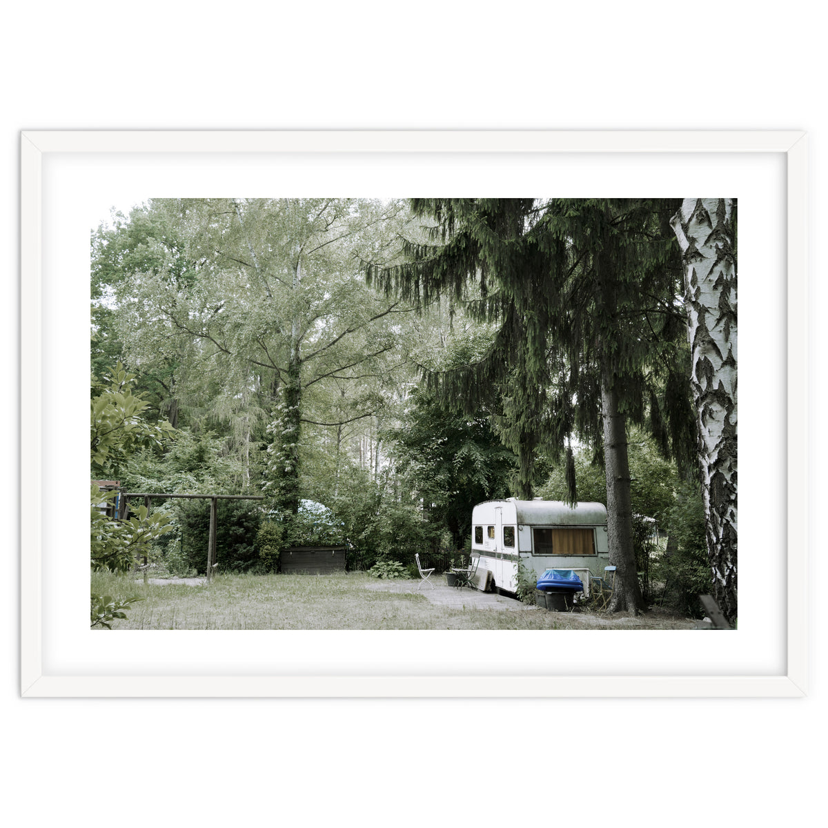 Travel trailer in the green garden