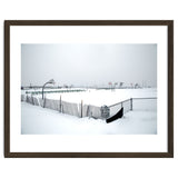 Snow-covered deserted basketball court in winter thumbnail