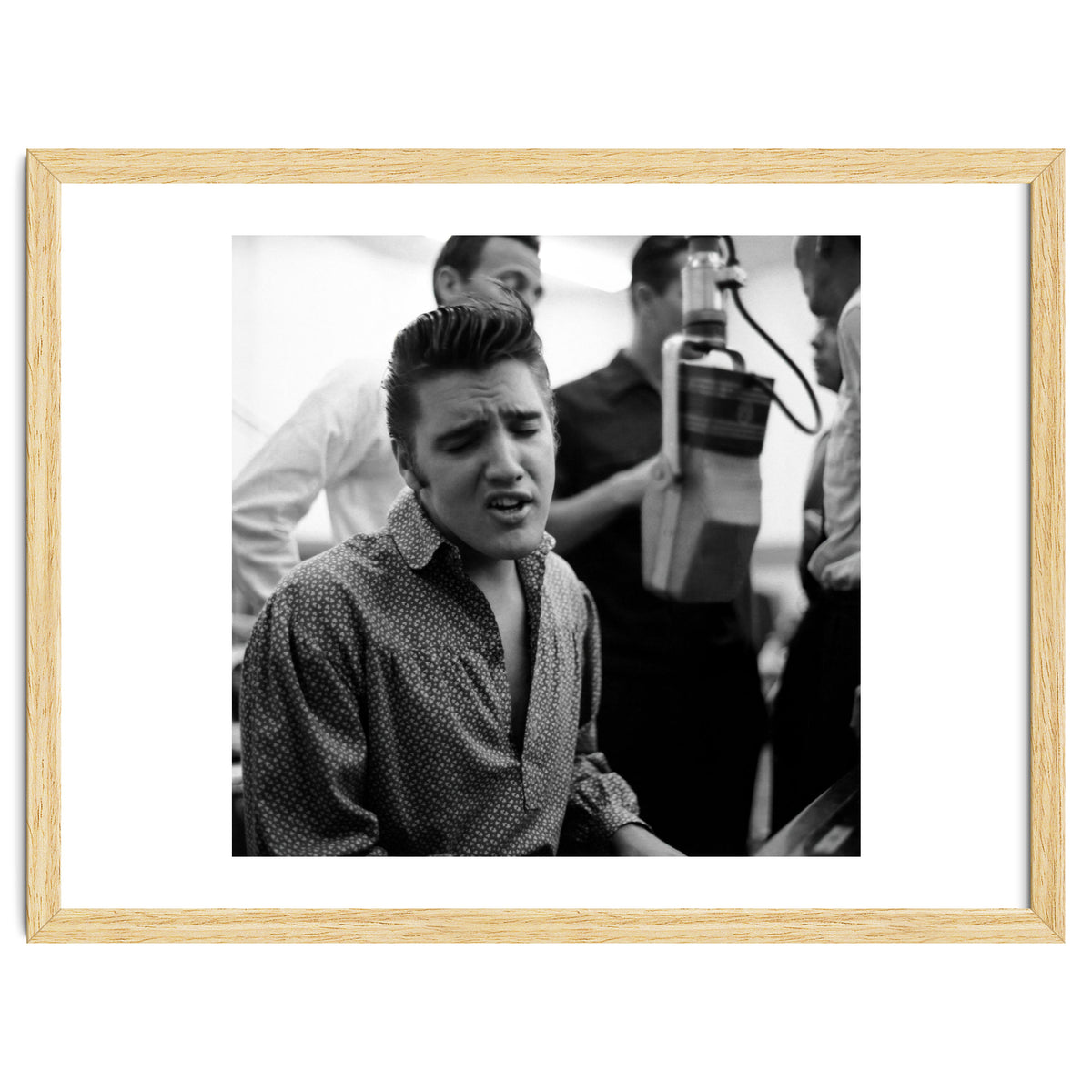 The American singer Elvis Presley during a recording session in 1956.