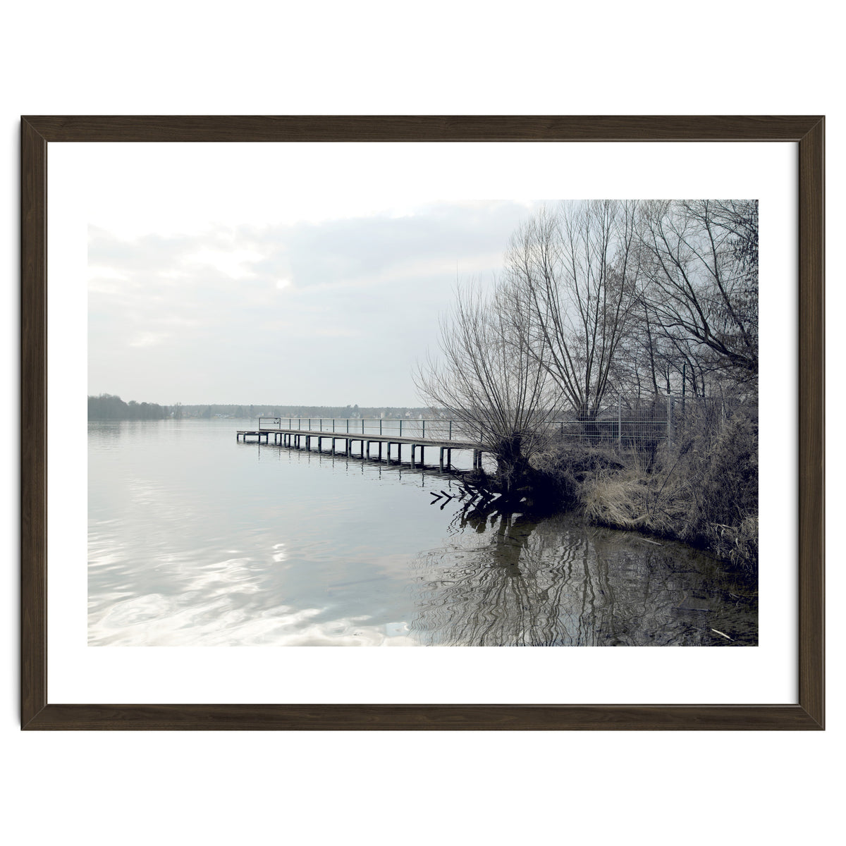 Sunny day pier in the lake