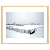 Snow-covered deserted basketball court in winter thumbnail