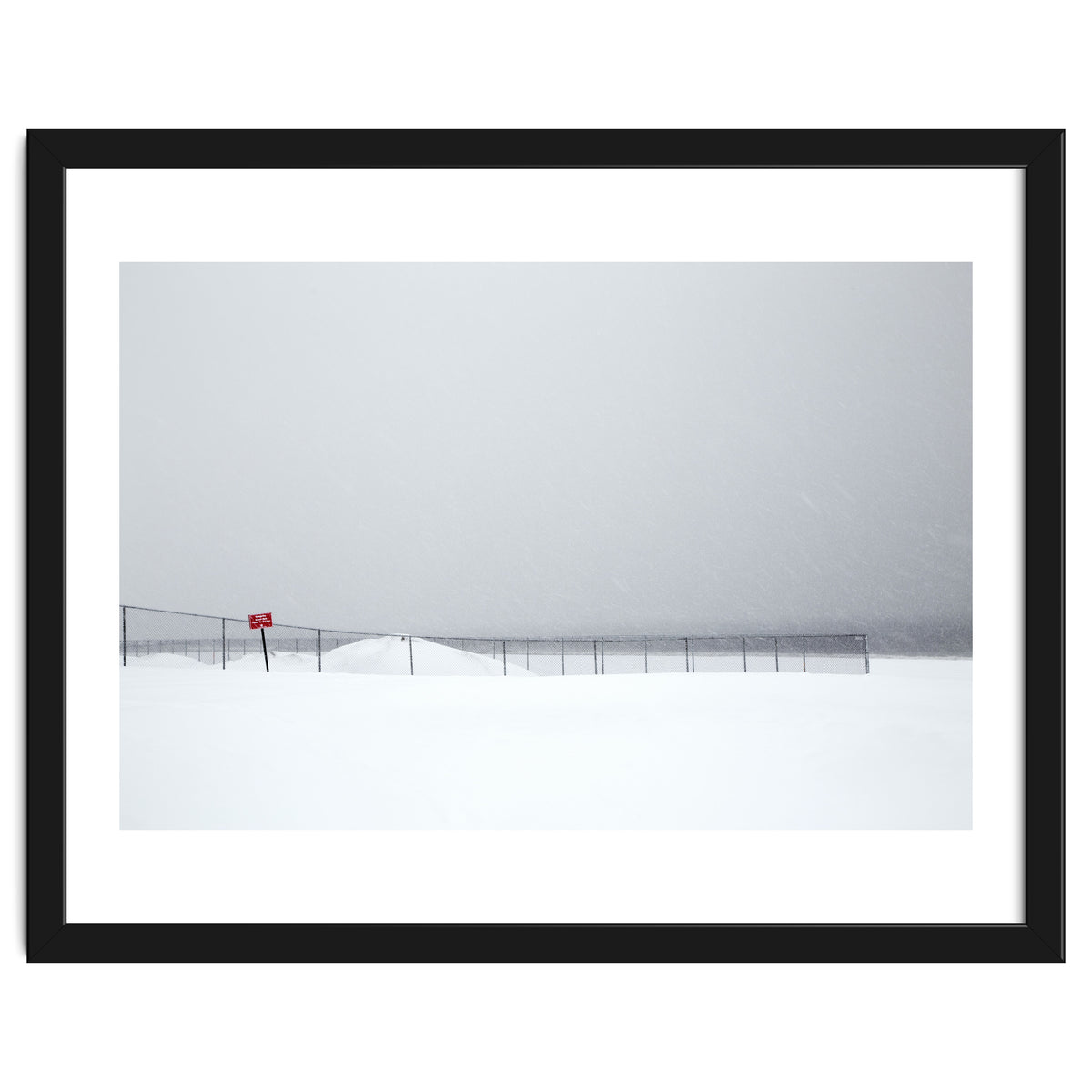 Fence in the winter seascape