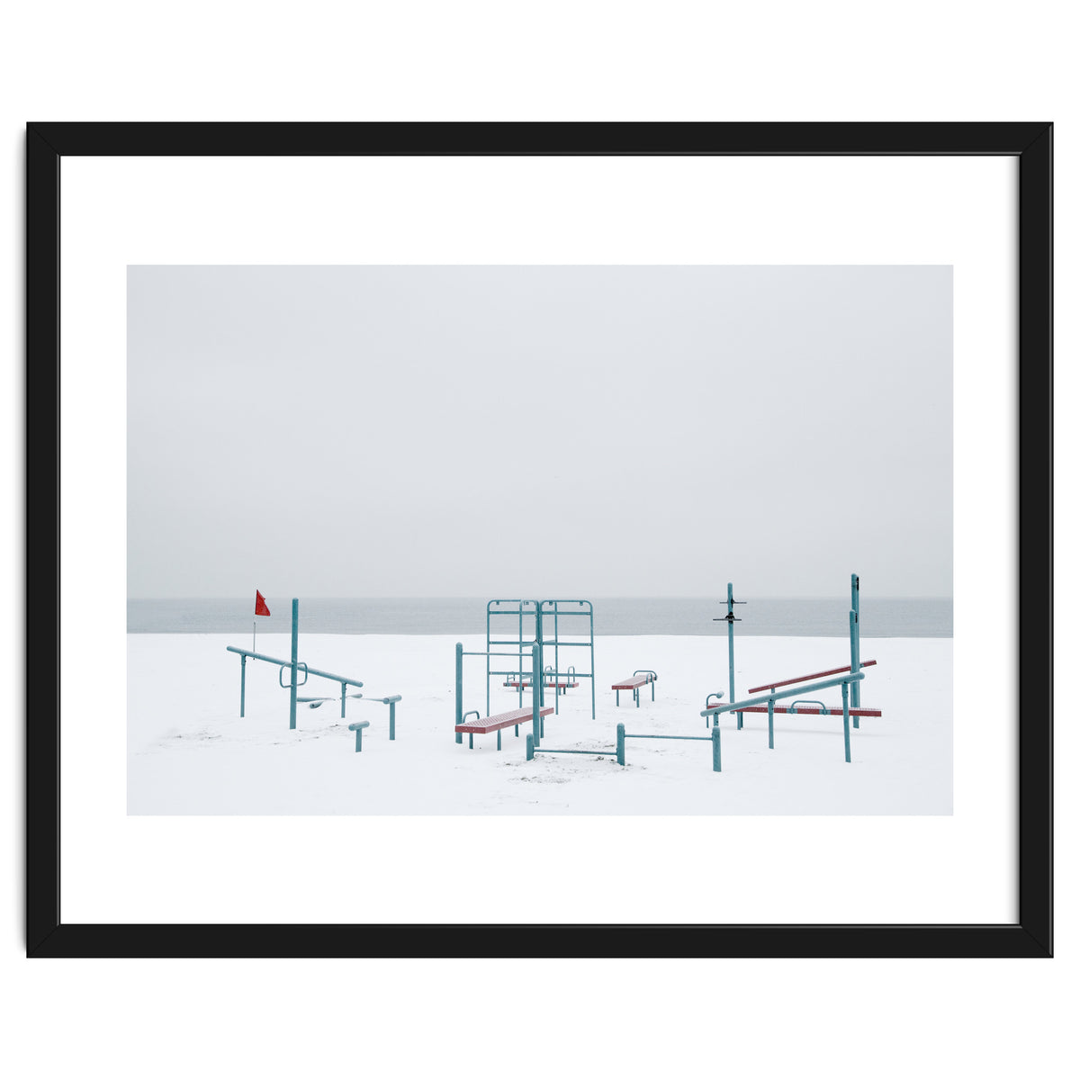 Playground in the winter snow beach