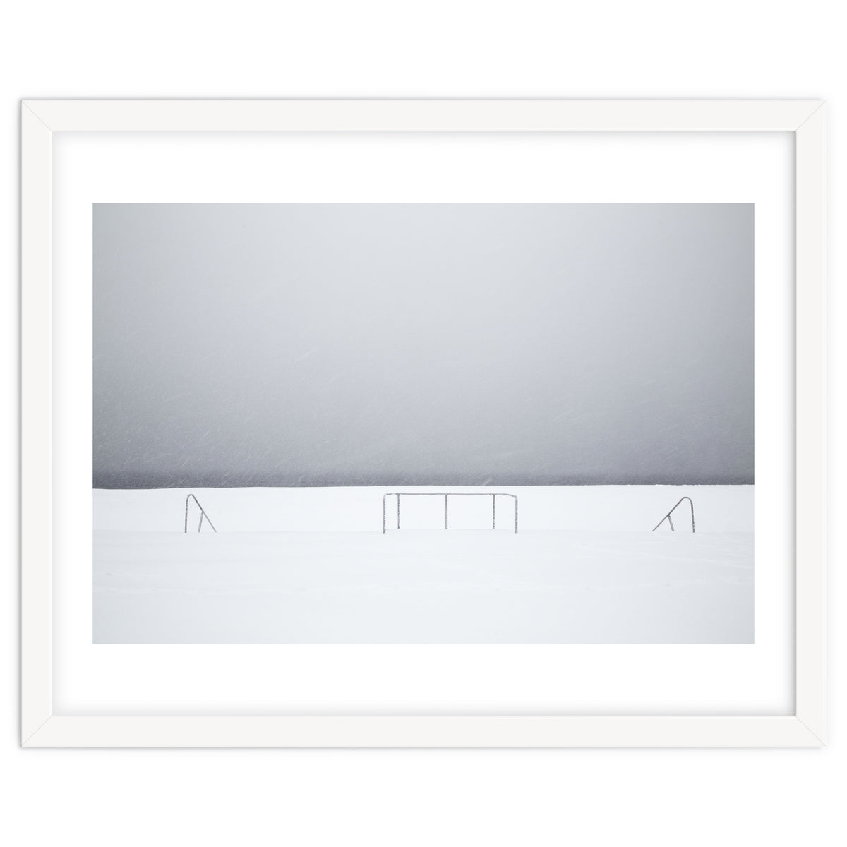 Stair railing covered by snow