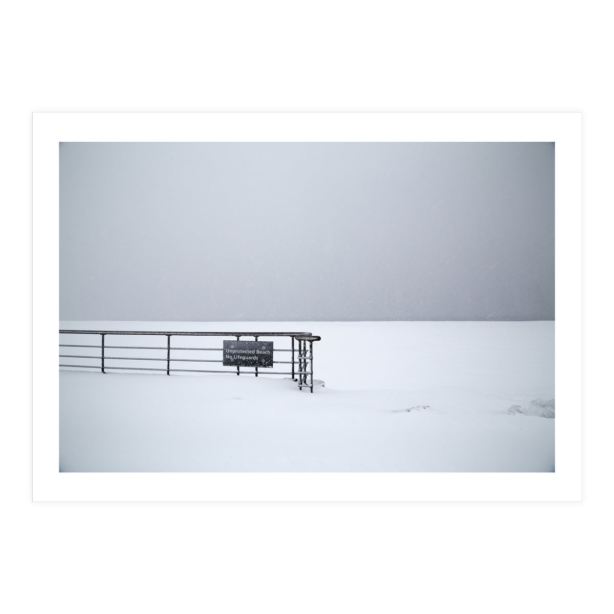 No lifeguards on the sign board in the winter snow beach (Print Only)