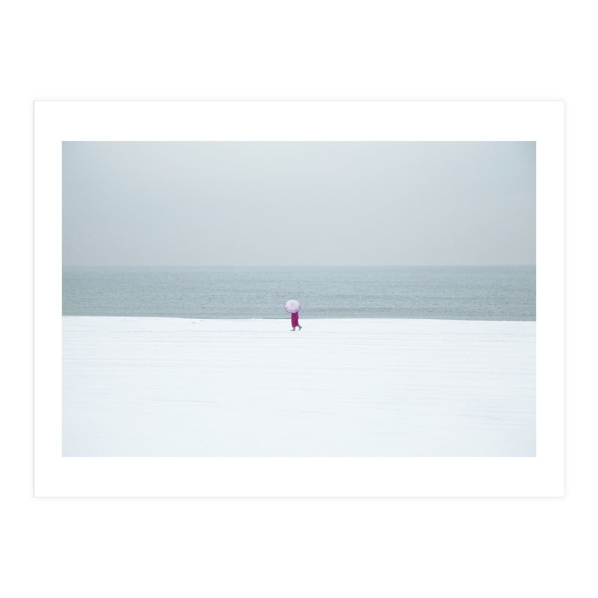 A walking woman in the winter snow beach (Print Only)