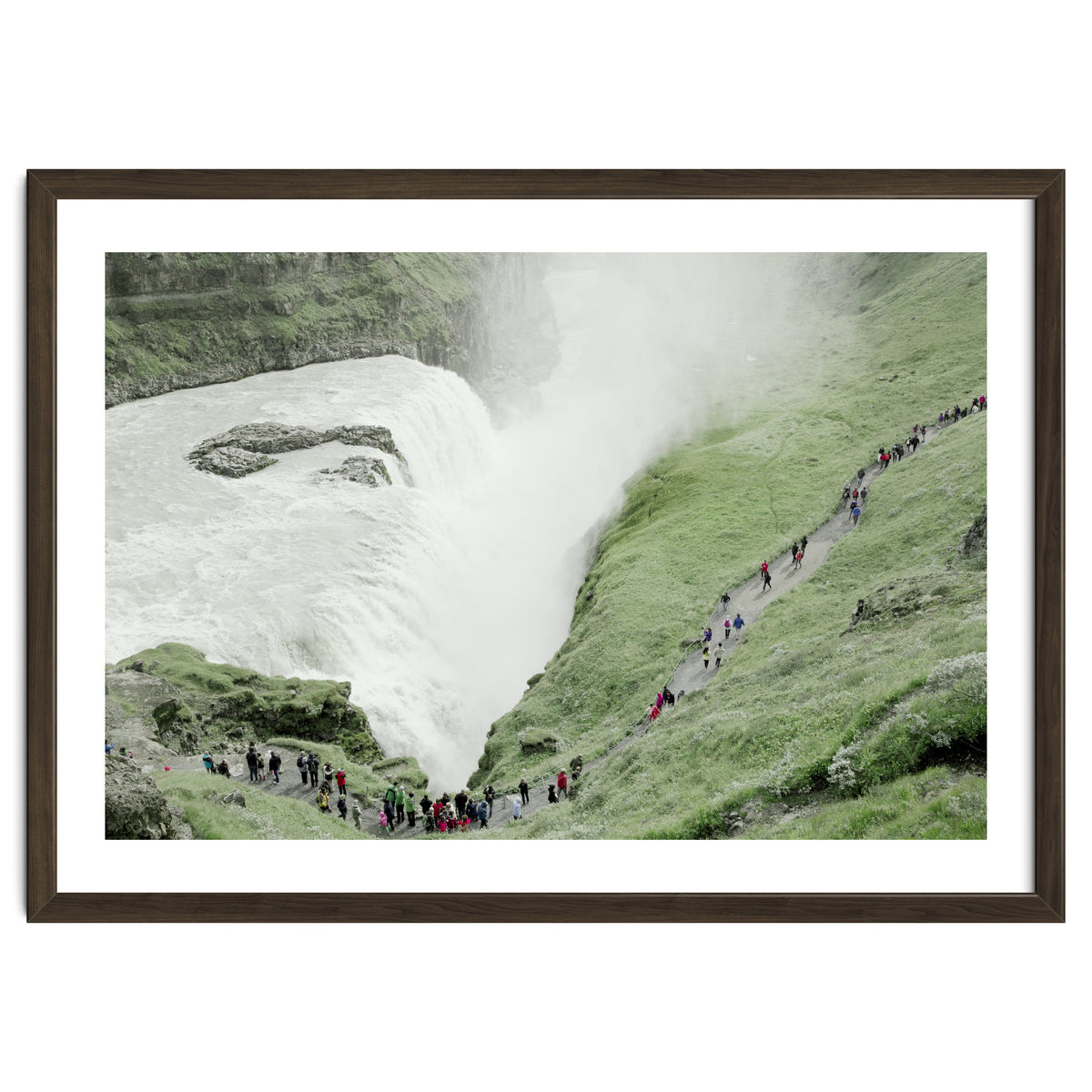 Tourists walking around the waterfall - Iceland