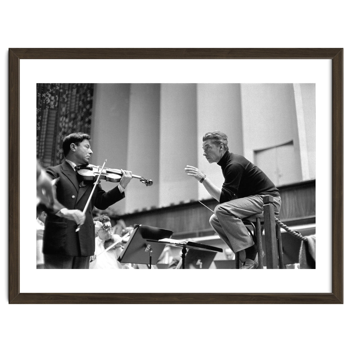 Conductor Herbert von Karajan rehearsing with Nathan Milstein in Lucerne, Switzerland. Lucerne,1957.