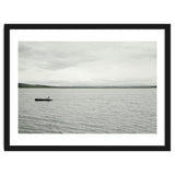 A boy pedaling the Board on the Lake - Iceland thumbnail