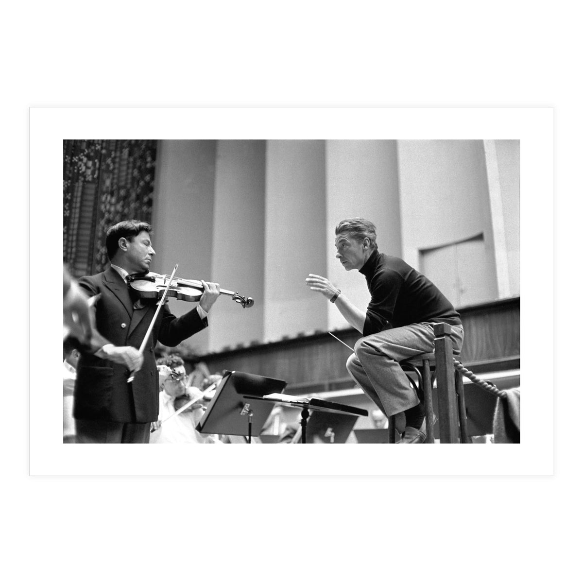 Conductor Herbert von Karajan rehearsing with Nathan Milstein in Lucerne, Switzerland. Lucerne,1957. (Print Only)