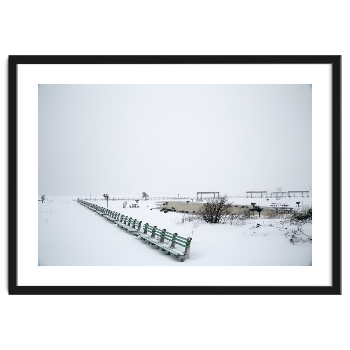 No people on a bench in the snowy winter