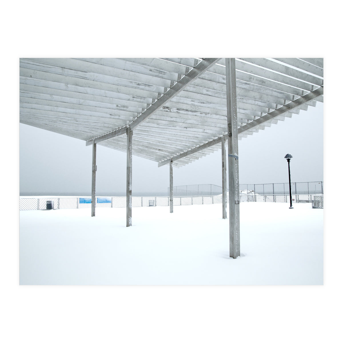 Sunshade site in the winter beach (Print Only)
