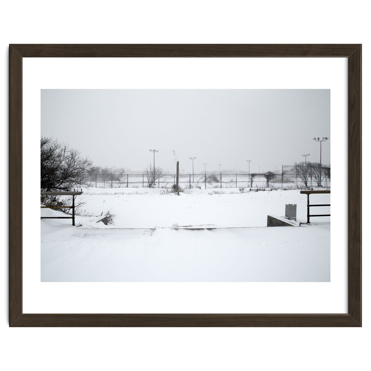 Baseball field covered in snow