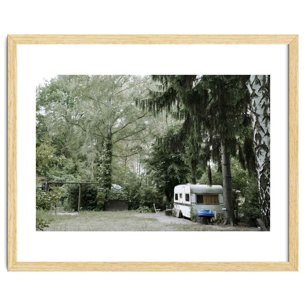 Travel trailer in the green garden