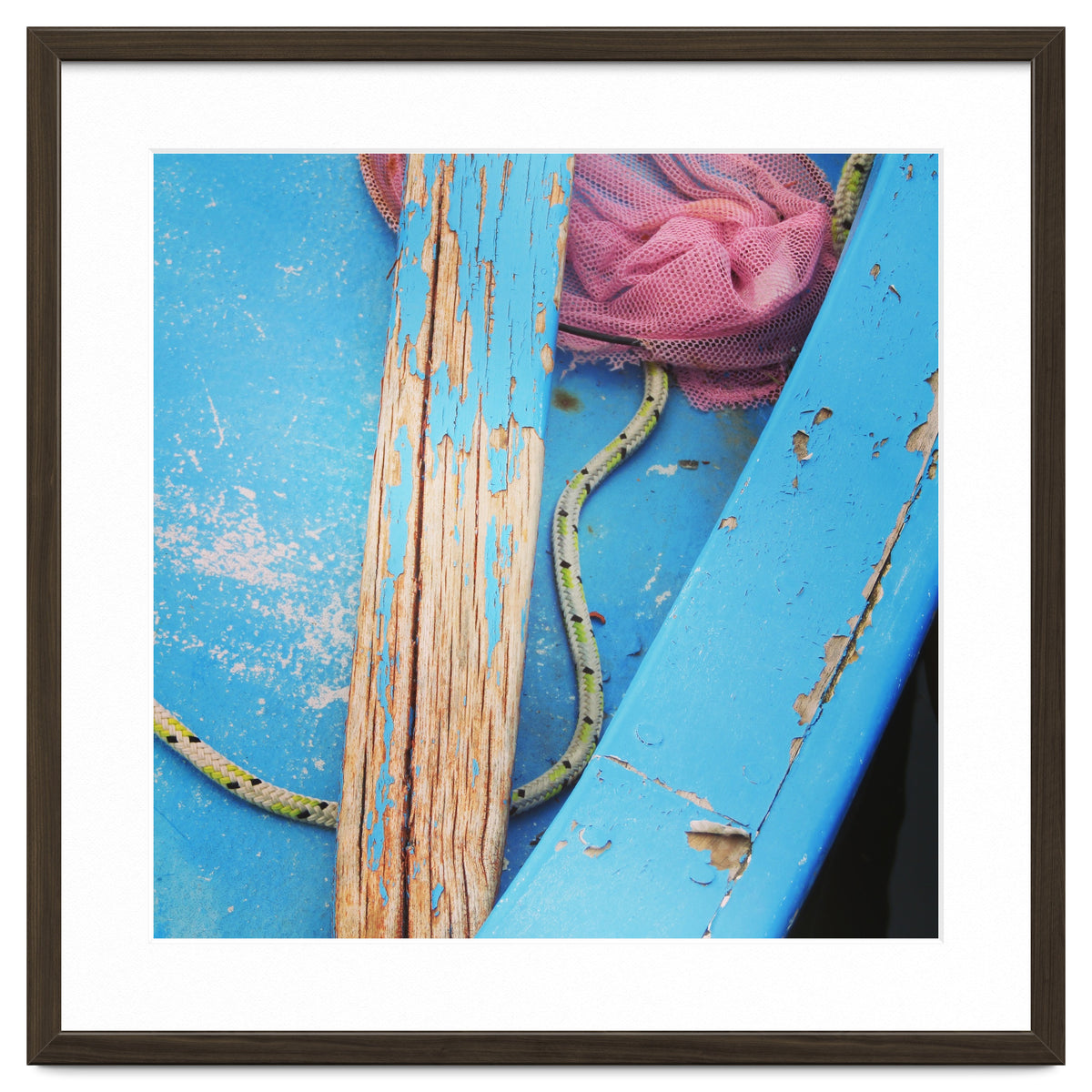 Weathered boat, sail and oar