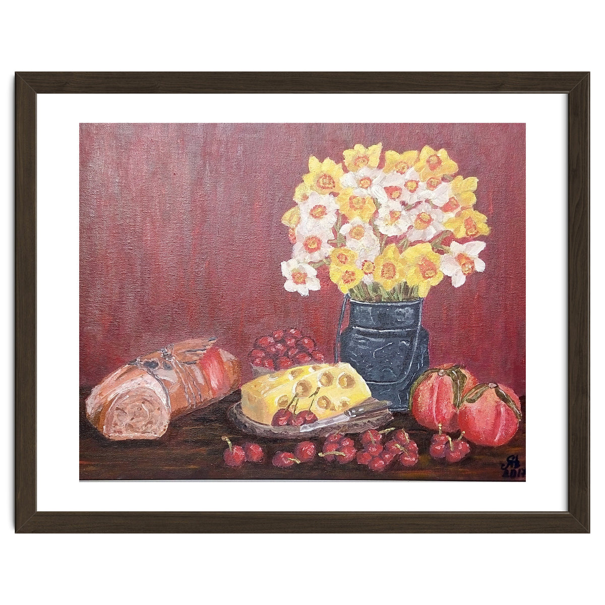 Still life with cheese, daffodils on a red background.